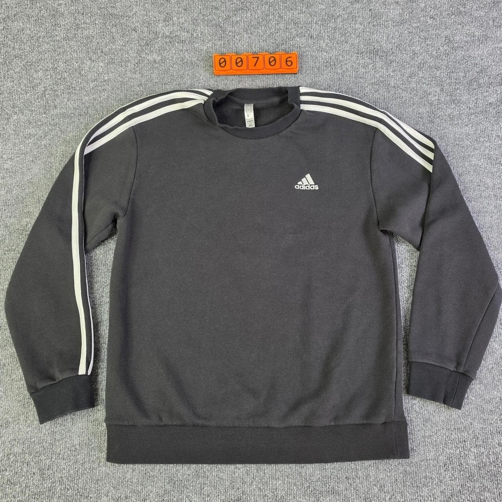 Adidas black crewneck sweatshirt with white stripes on sleeves, size M